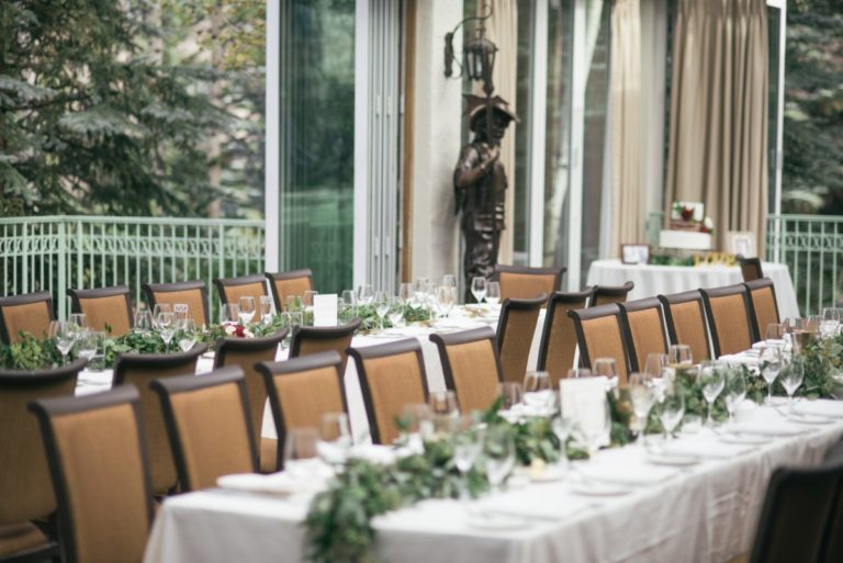 Wedding reception room with tables and chairs