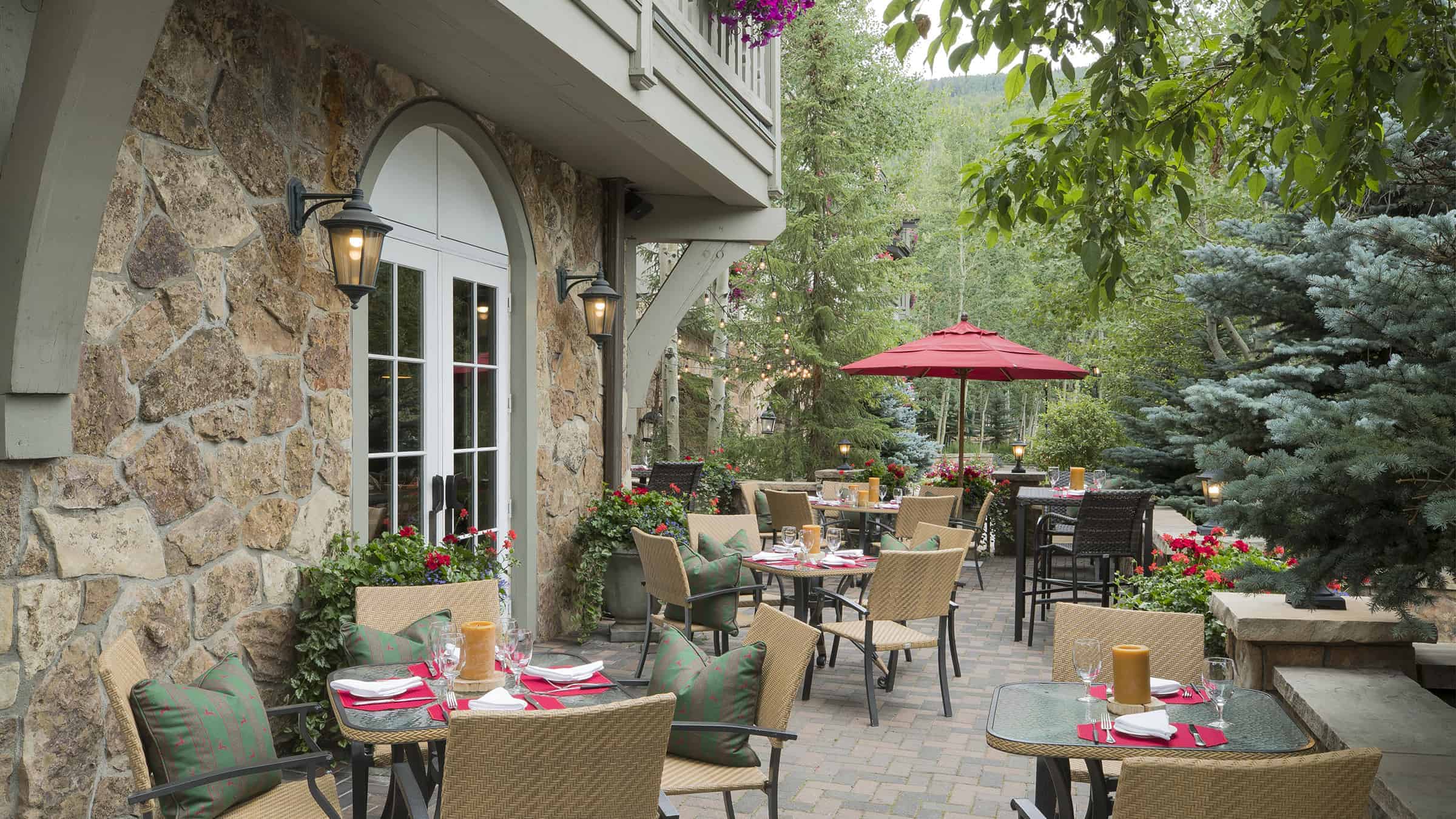 Sonnenalp Swiss Chalet outdoor patio with tables, and chairs