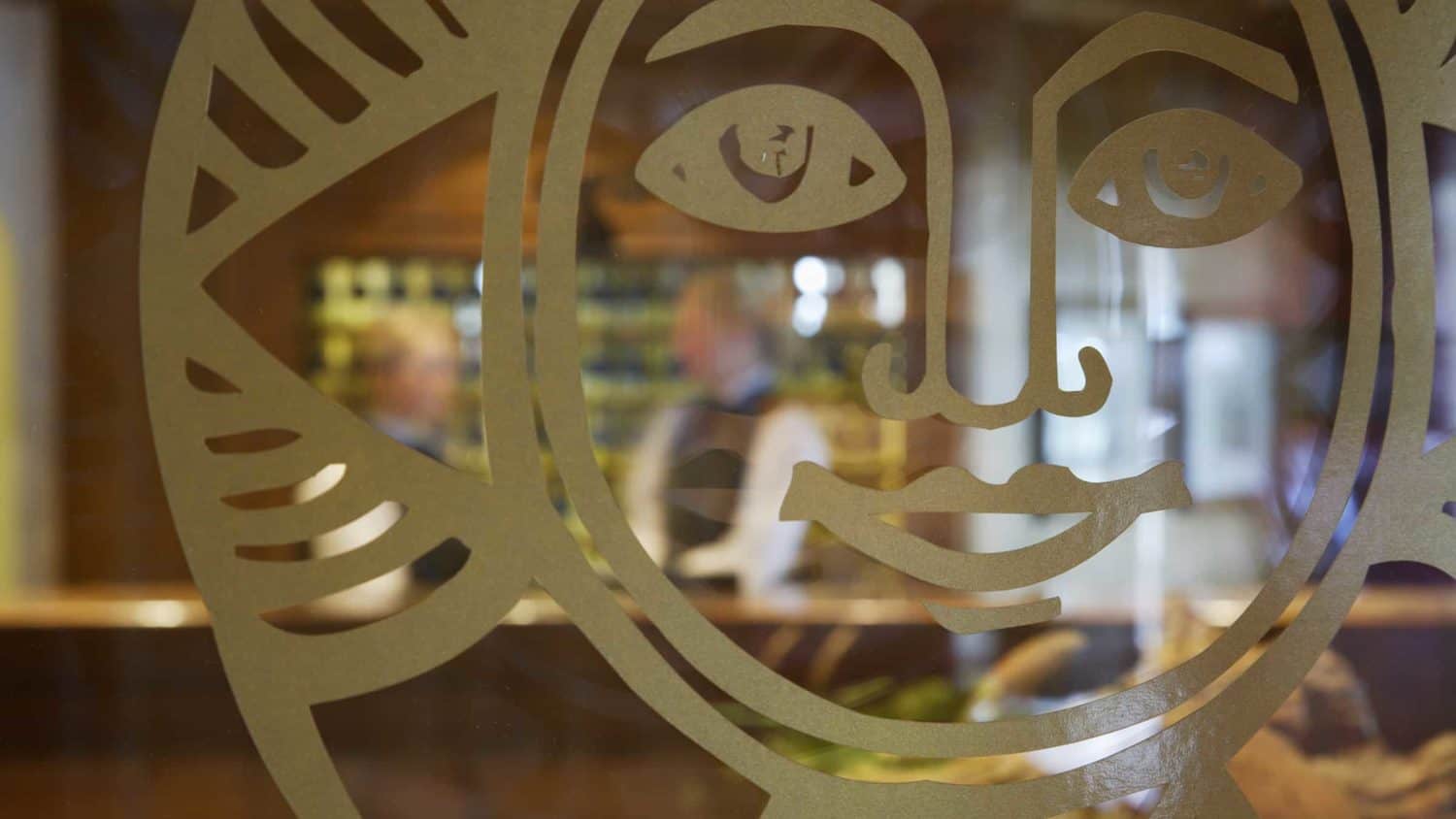 Sonnenalp logo decal on glass