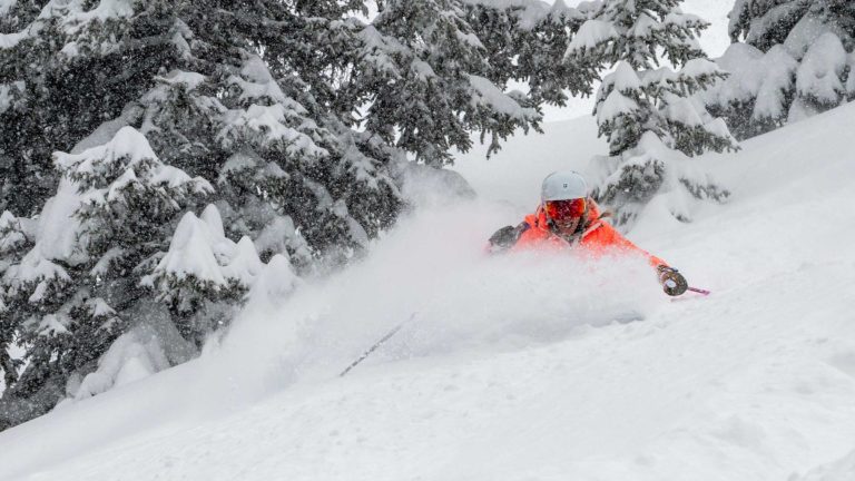 Skier carving snow in Vail