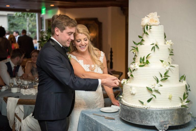Brde and groom cutting cake