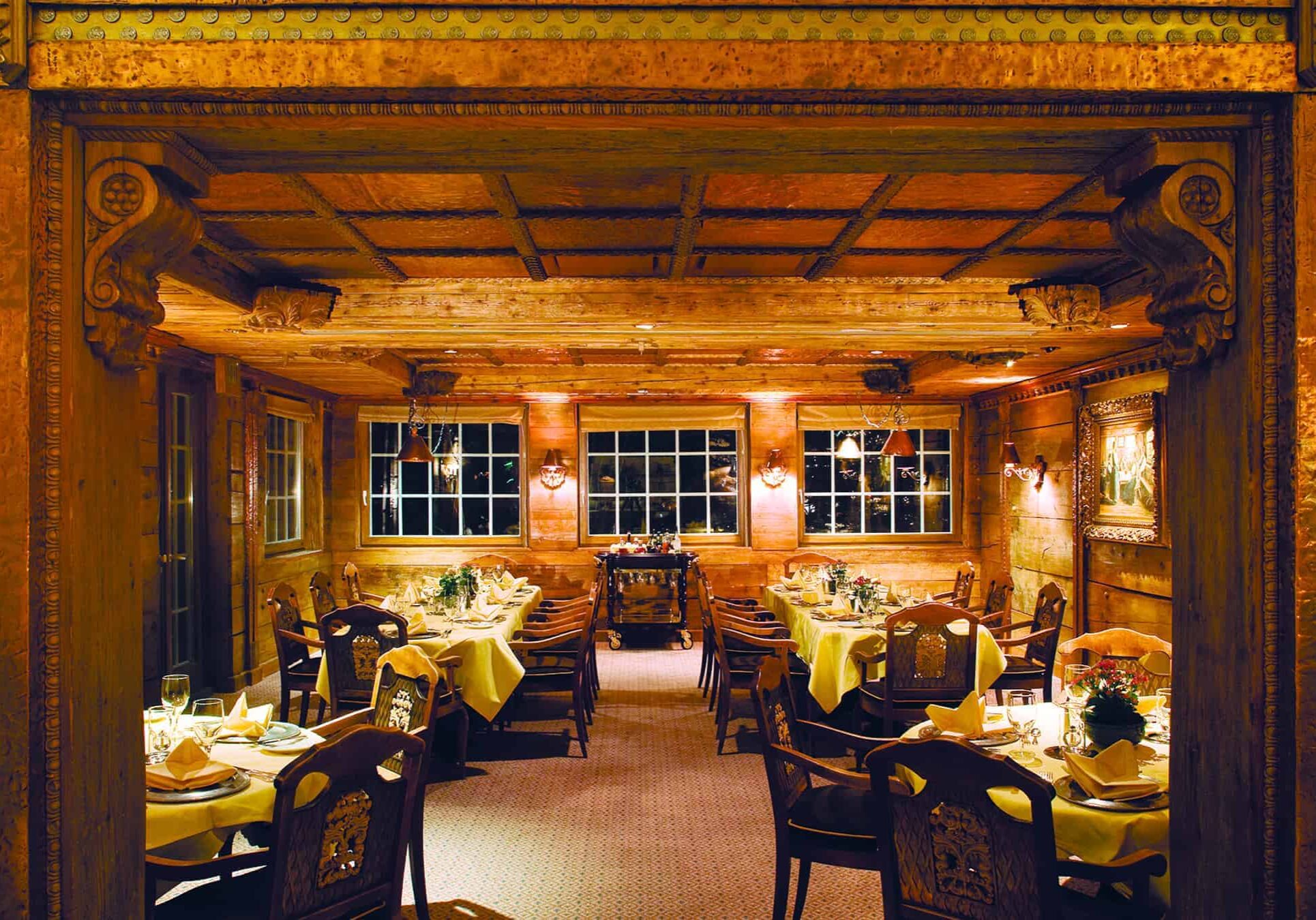 Restaurant room with tables and place settings