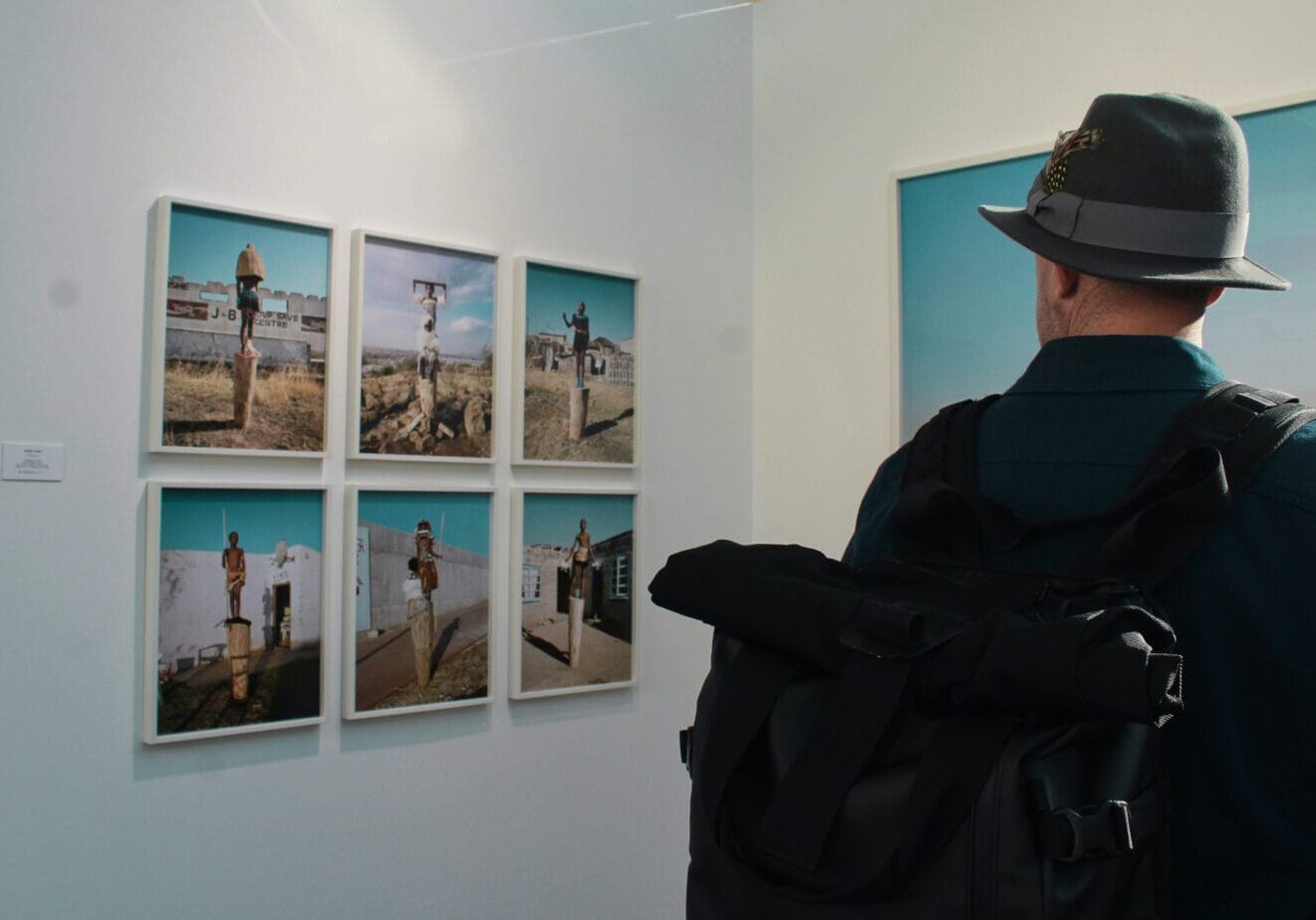 Man viewing art in gallery